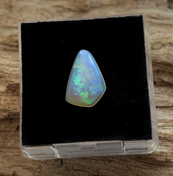 Andamooka Opal Triangular Freeform 11×7.7mm – Langford Gems