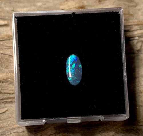 Lightning Ridge Black Opal Oval Cabochon 7.45x3.9mm