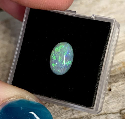 Mintabie Black Opal Oval Cabochon 9.8x6.7mm